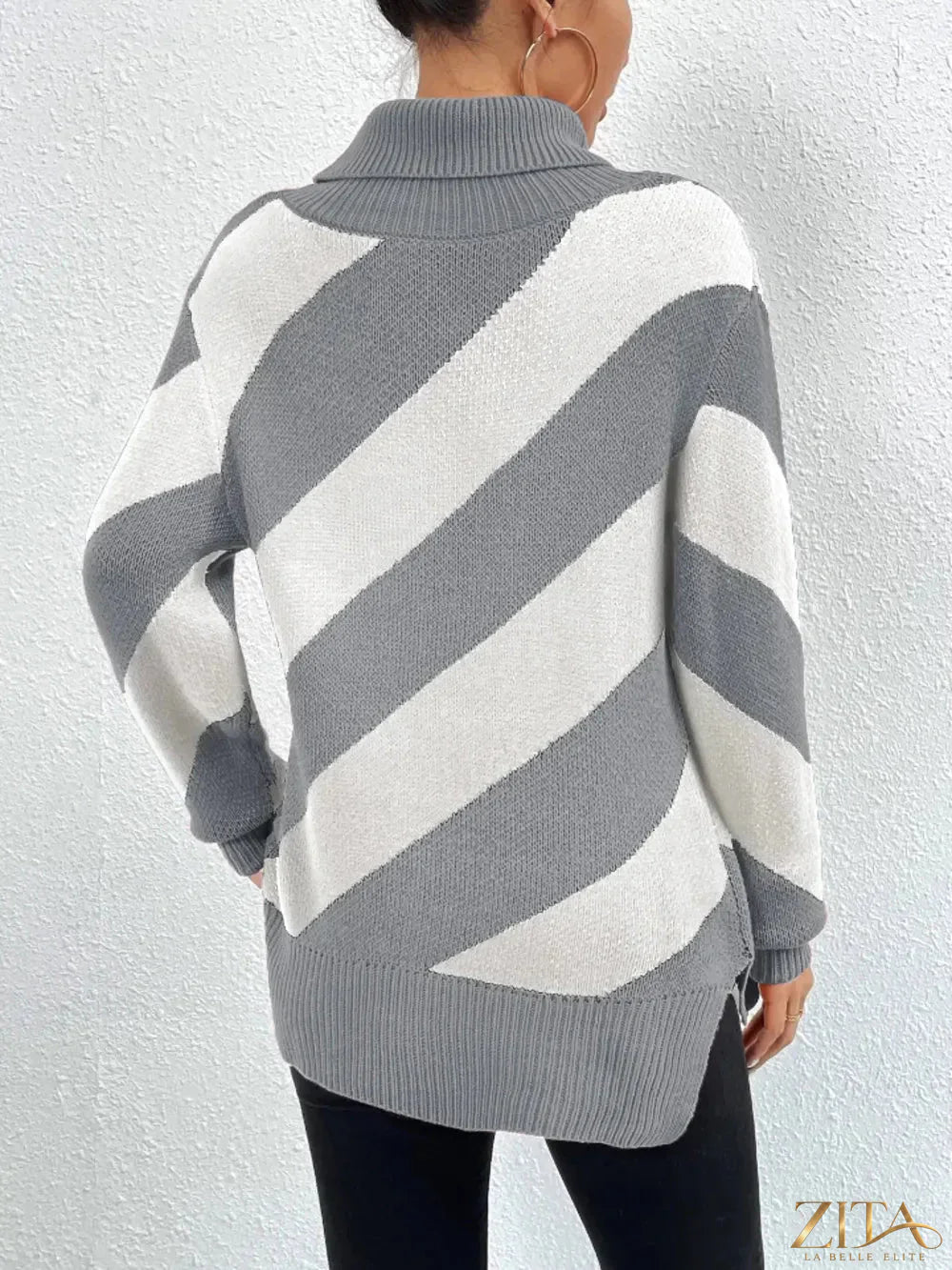 Trendsi striped turtleneck sweater with dropped shoulders, featuring a cozy knit and multicolor horizontal stripes.