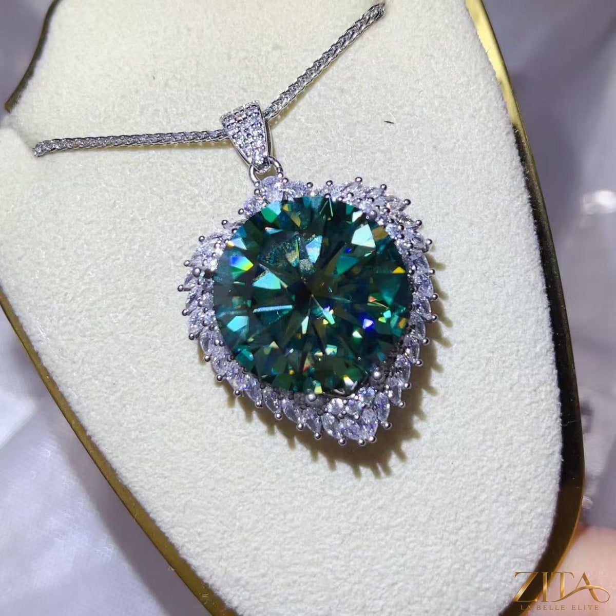 Sterling silver pendant necklace with a 20-carat moissanite gemstone, showcasing elegant jewelry design.