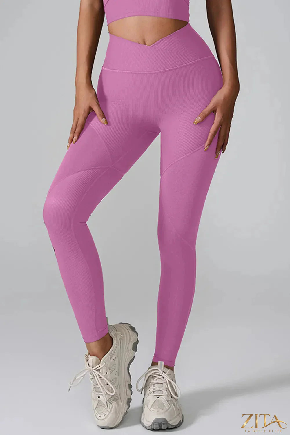 Black high waist active leggings by Trendsi, stretchy fabric, fitted design, suitable for workout or casual wear.