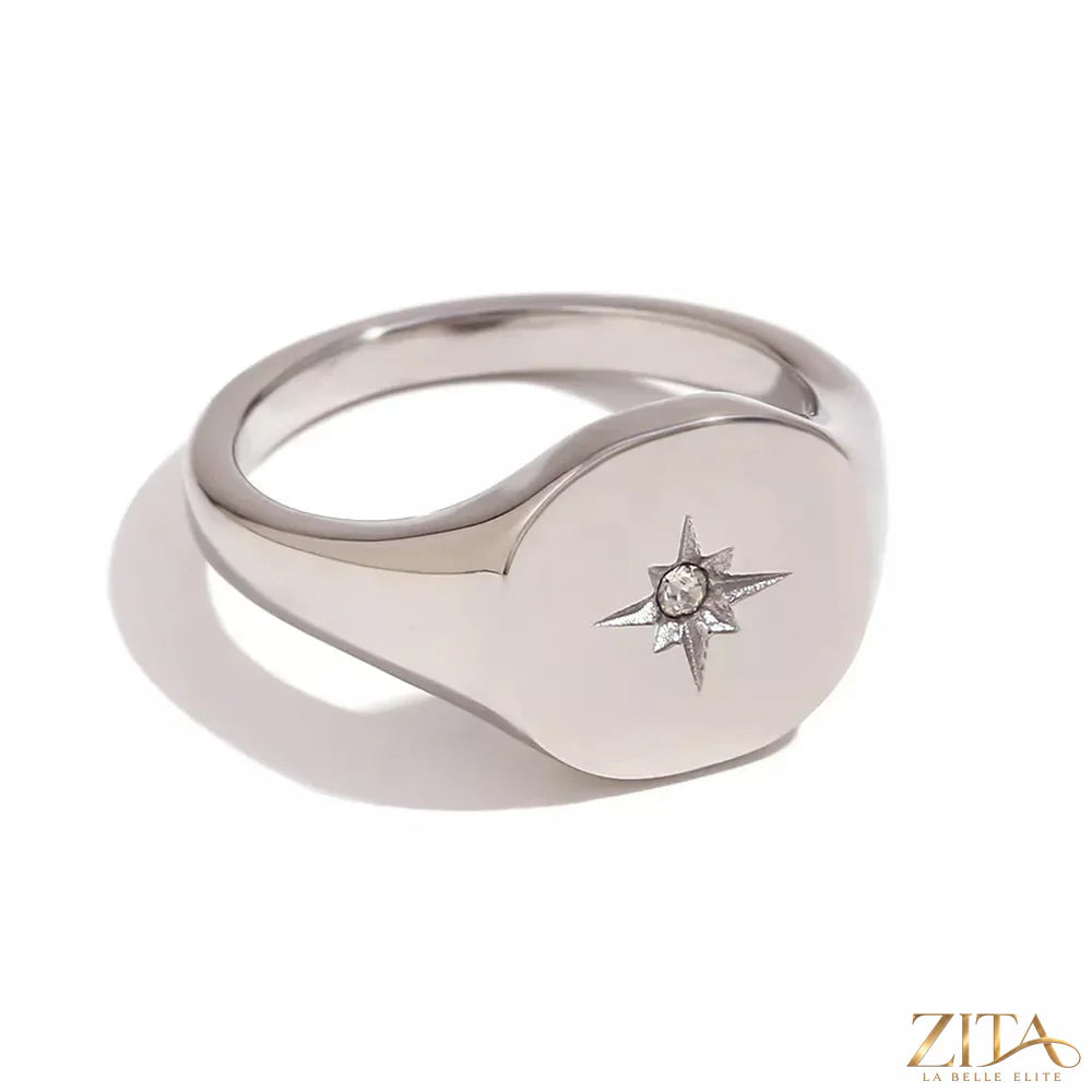 Silver minimalist North Star signet ring by Zita La Belle Elite, featuring a sleek, engraved star design on a smooth band.