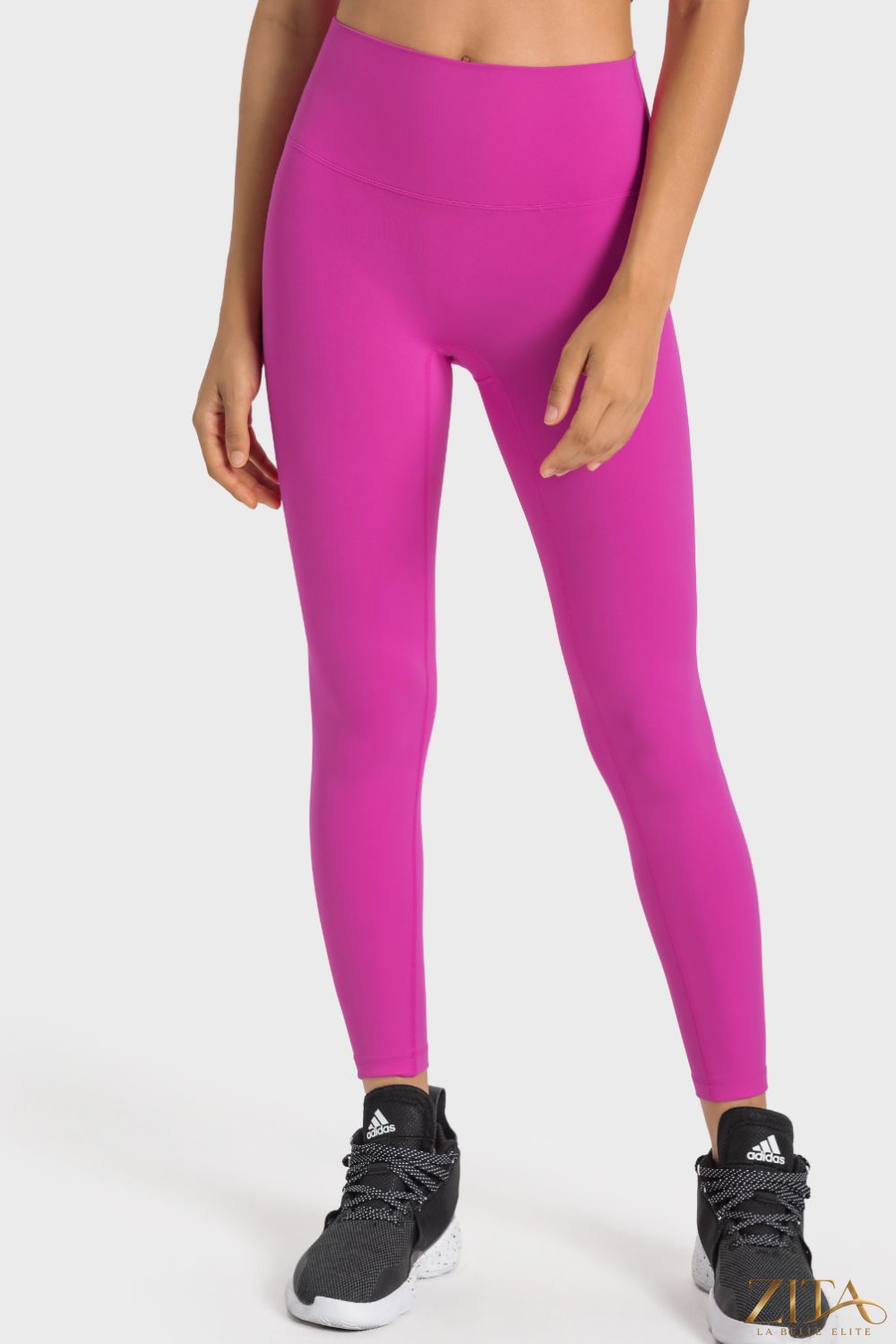 Millennia high-rise wide waistband yoga leggings in black, featuring a comfortable stretch fit for active wear and casual workouts.