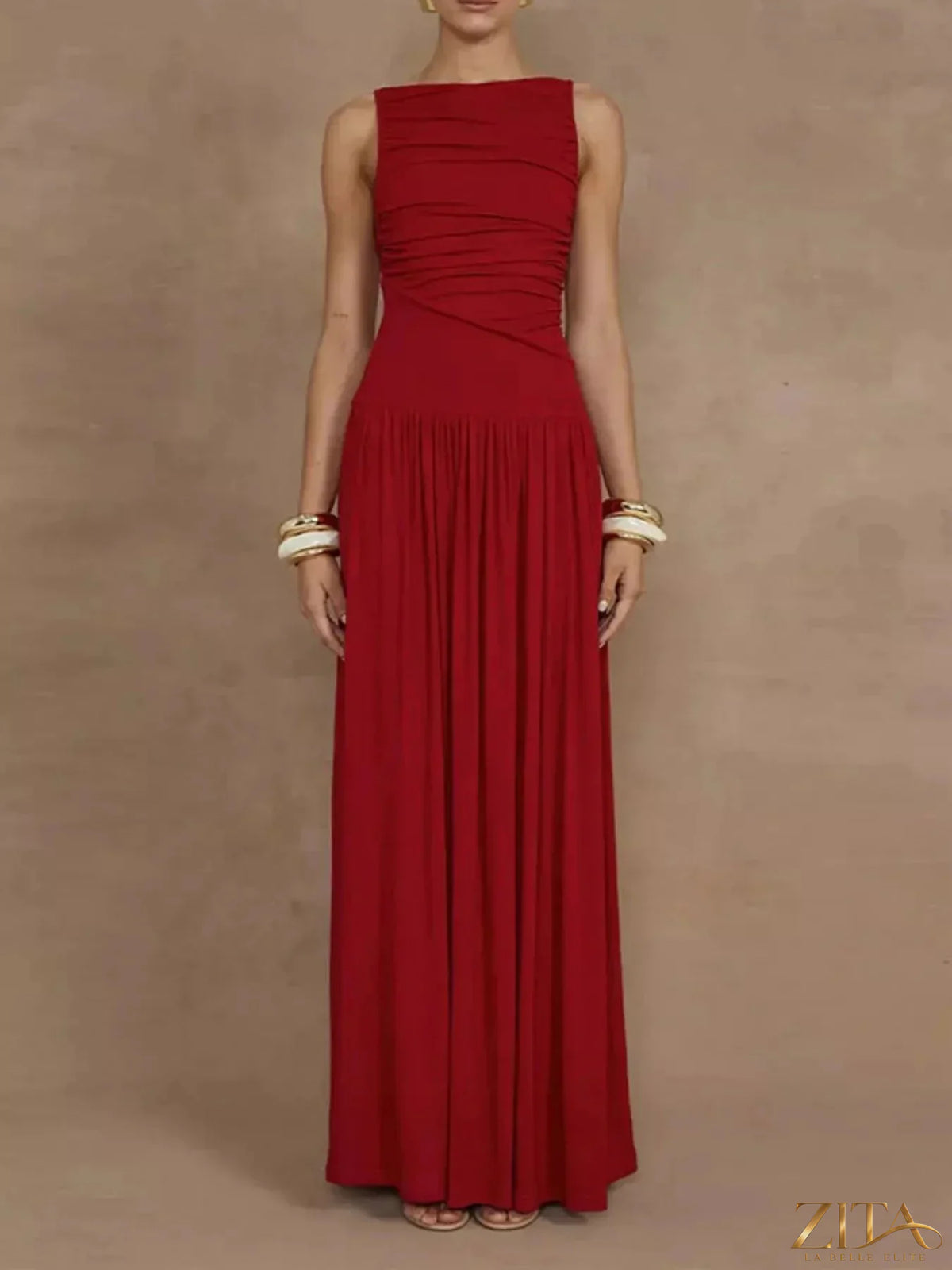 Zita La Belle Elite ruched sleeveless maxi dress in flowing fabric, featuring a fitted bodice and elegant ankle-length design.