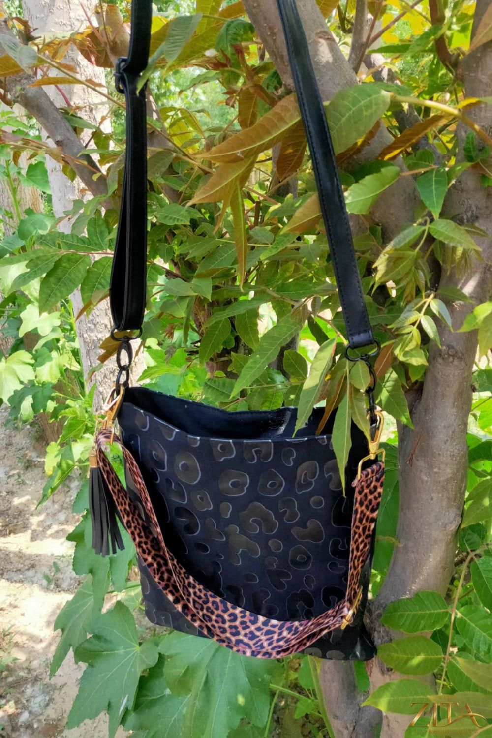 Zita La Belle Elite Adored PU leather shoulder bag with tassel, stylish accessory with adjustable strap and decorative details.