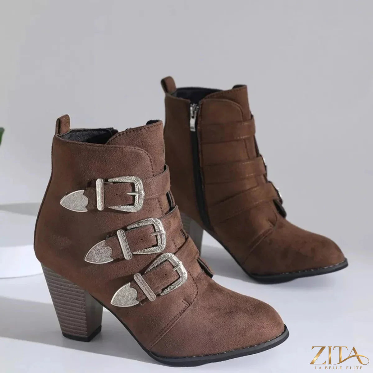 Point toe block heel boots by Trendsi featuring sleek design and stylish ankle height, perfect for fashion-forward outfits.