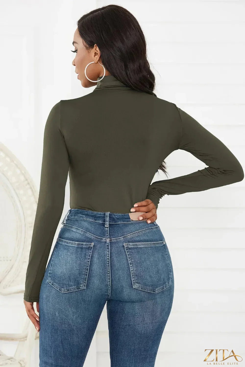 Zita La Belle Elite turtleneck long sleeve bodysuit in black, close-up of fitted design and soft stretch fabric.