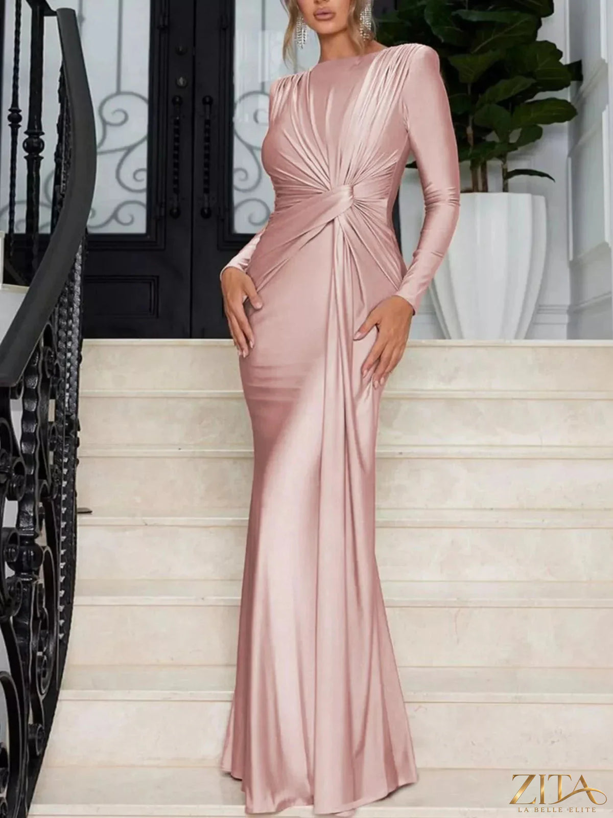 Zita La Belle Elite twisted long sleeve maxi dress in flowy fabric, featuring a fitted waist and elegant design.
