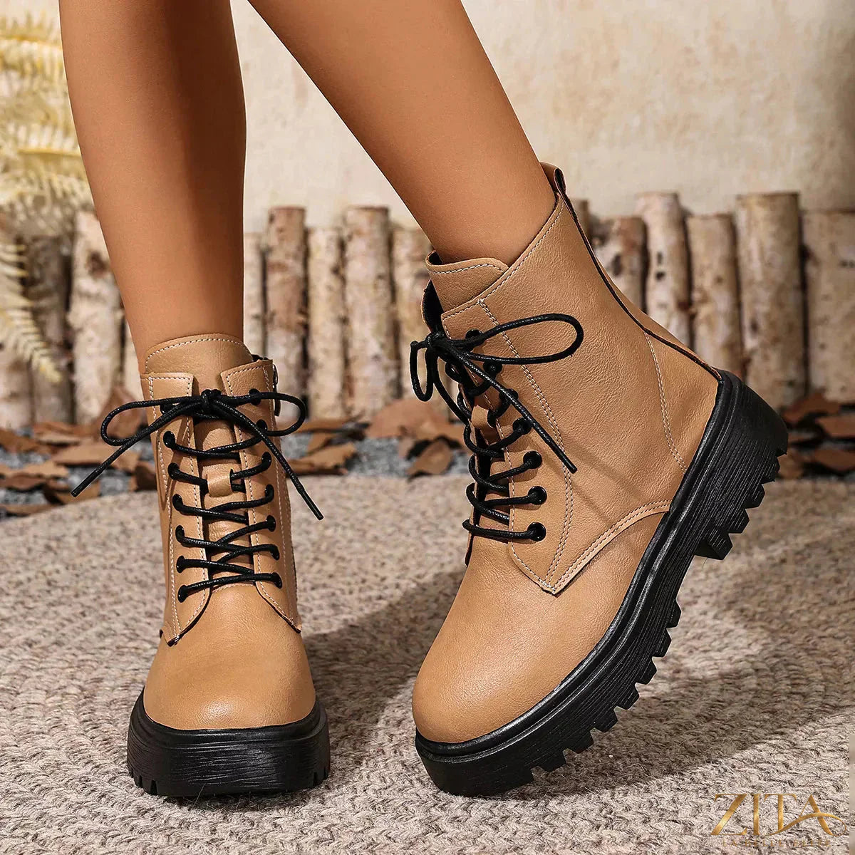 Zita La Belle Elite lace-up ankle combat boots with chunky soles and metal eyelets, styled for rugged casual wear.