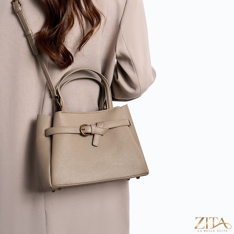 Zita La Belle Elite leather top handle handbag with structured design, featuring a smooth leather surface and elegant gold-tone hardware.