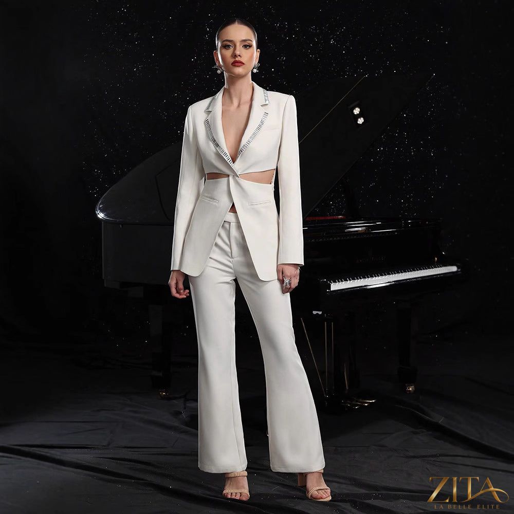Women's elegant hollow-out long-sleeve suit jacket and pants set by Zita La Belle Elite, featuring sophisticated tailoring and stylish design.