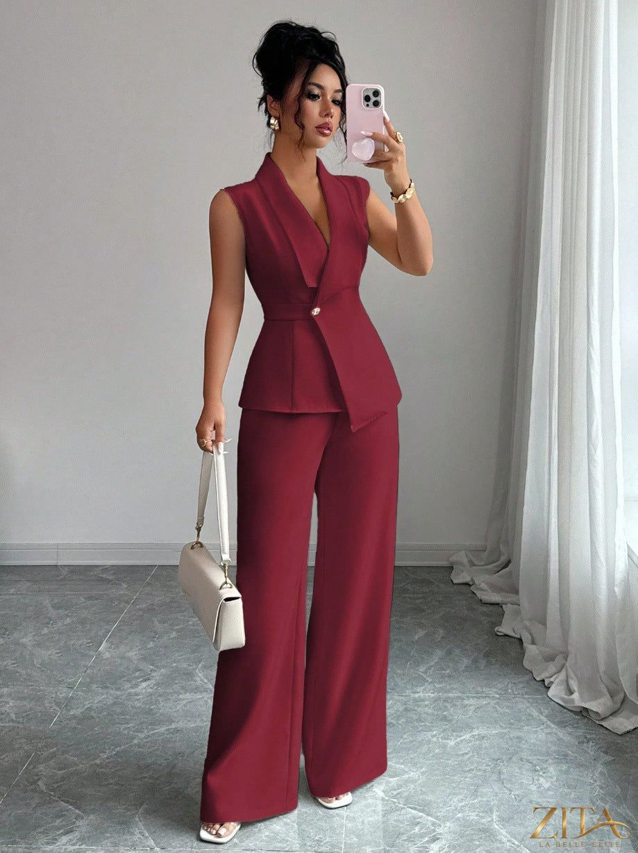 Zita La Belle Elite women's sleeveless peplum blazer and wide-leg pants two-piece set, stylish formal outfit on a model.