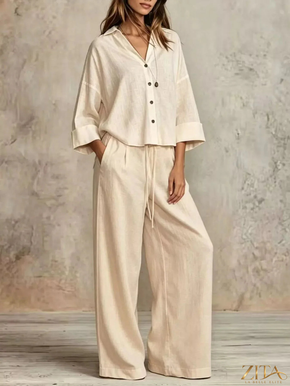 Plus size Zita La Belle Elite button-down shirt and wide-leg pants set on a model, showcasing a stylish, coordinated outfit.