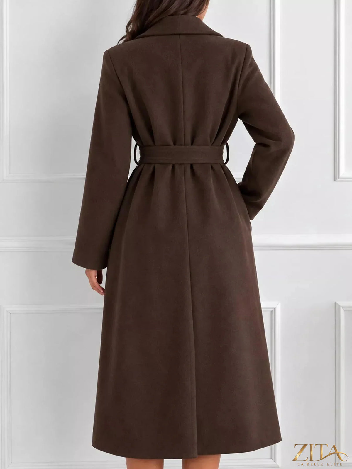 Zita La Belle Elite belted coat with lapel collar, long sleeves, and tailored fit, shown in a stylish, neutral-colored fabric