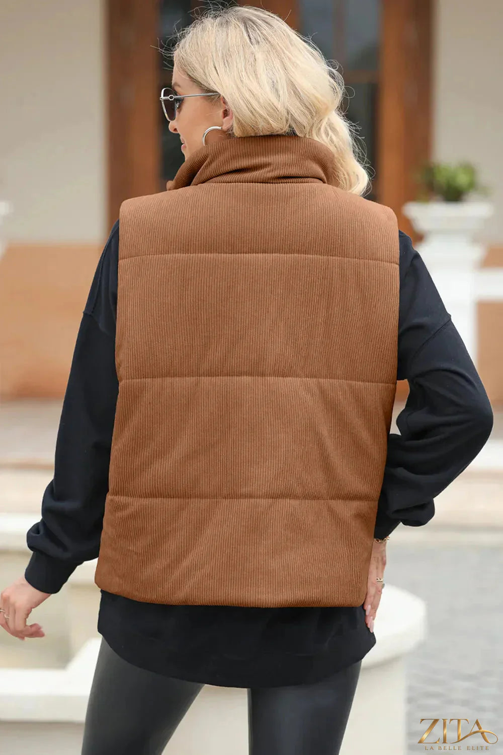 Trendsi pocketed zip-up turtleneck vest coat in black, featuring a front zipper, side pockets, and a fitted design.