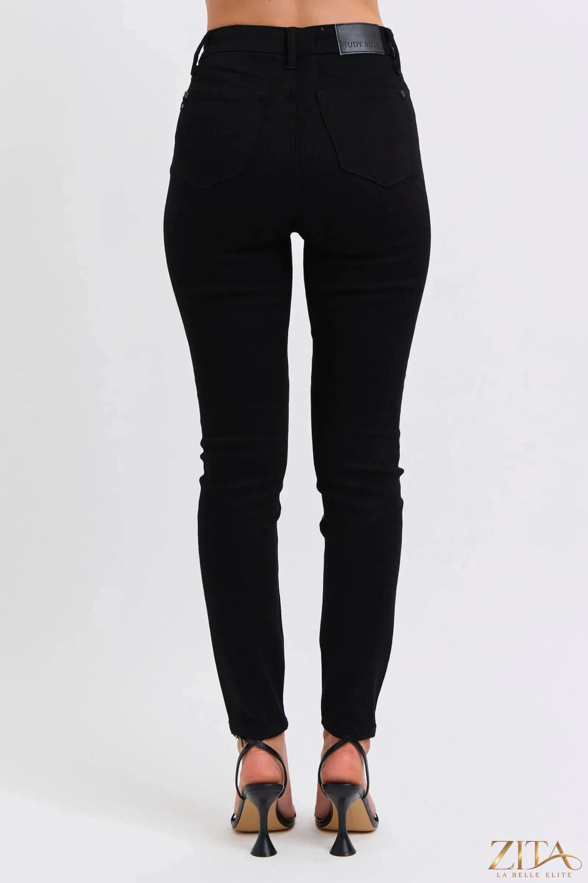 Zita La Belle Elite Judy Blue plus size faux leather skinny pants in black, close-up showing fit and texture of the faux leather fabric.