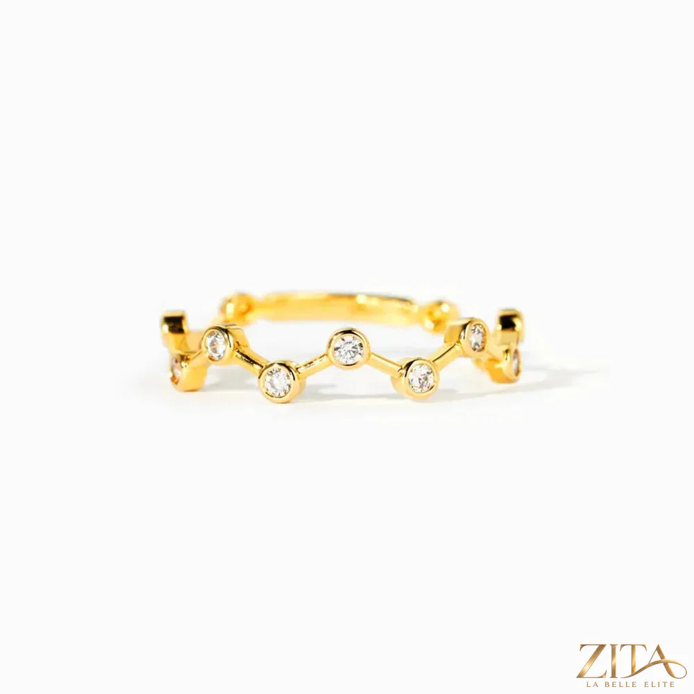 18K gold-plated sterling silver zircon ring by Zita La Belle Elite featuring a sparkling zircon stone and intricate band design.