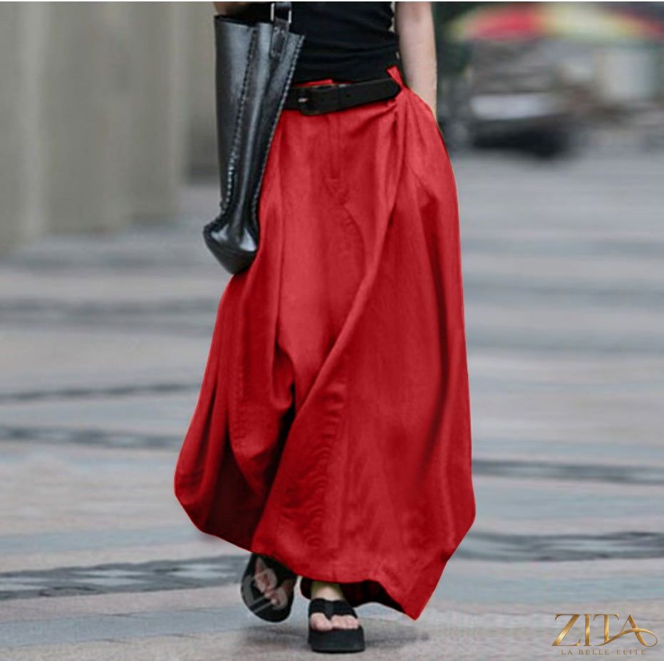 High-waist flared linen maxi skirt with pockets by Zita La Belle Elite, featuring a flowing design and casual style.
