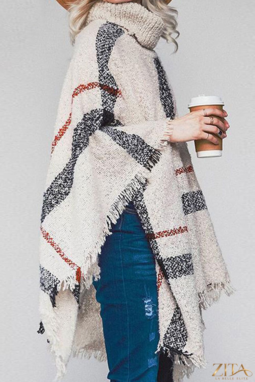 Plaid turtleneck raw hem poncho by Trendsi featuring a cozy plaid pattern and stylish raw hem details.