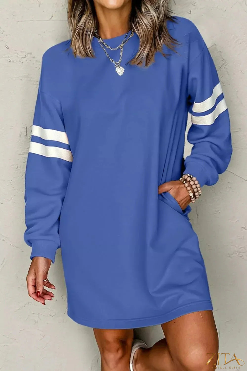 Zita La Belle Elite stripe long sleeve casual sweatshirt dress hanging on a wooden hanger, featuring a relaxed fit and stylish design.