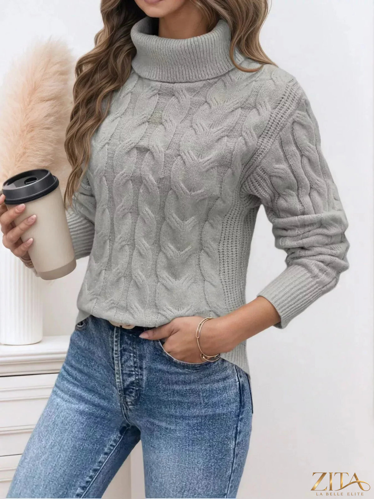 Zita La Belle Elite cable-knit turtleneck sweater in soft, chunky knit with a high collar and classic design.