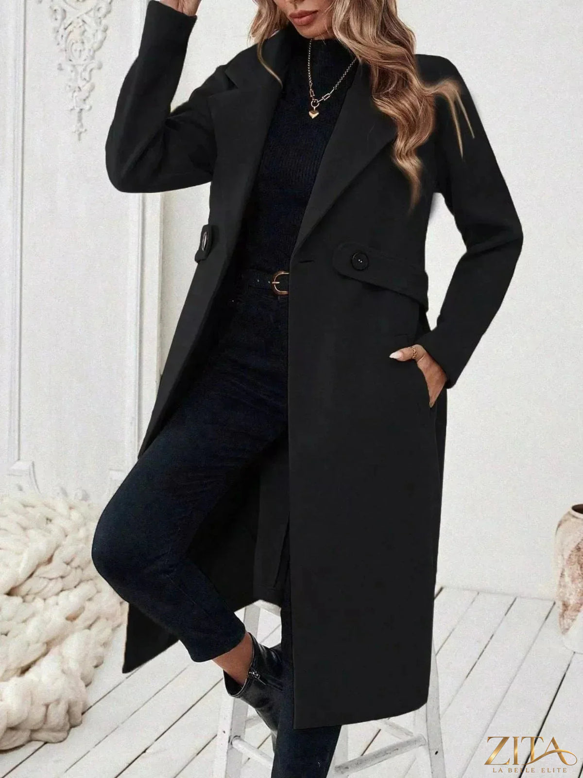 Zita La Belle Elite single-button longline coat in neutral fabric, stylish and tailored, shown on a model with a collar and long sleeves.