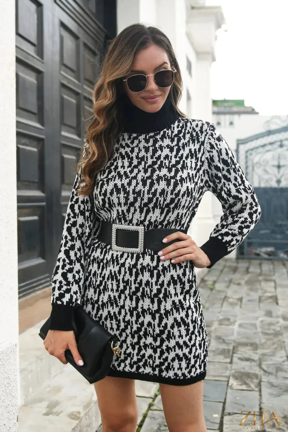Heathered turtleneck mini sweater dress by Trendsi, featuring a cozy knit fabric and fitted silhouette in a stylish heathered pattern.