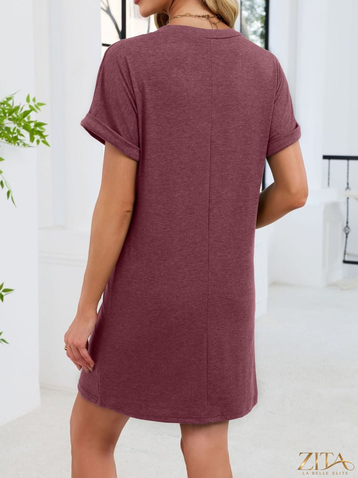 Zita La Belle Elite casual V-neck short sleeve T-shirt dress in soft fabric, shown on a model with a relaxed fit and simple style.