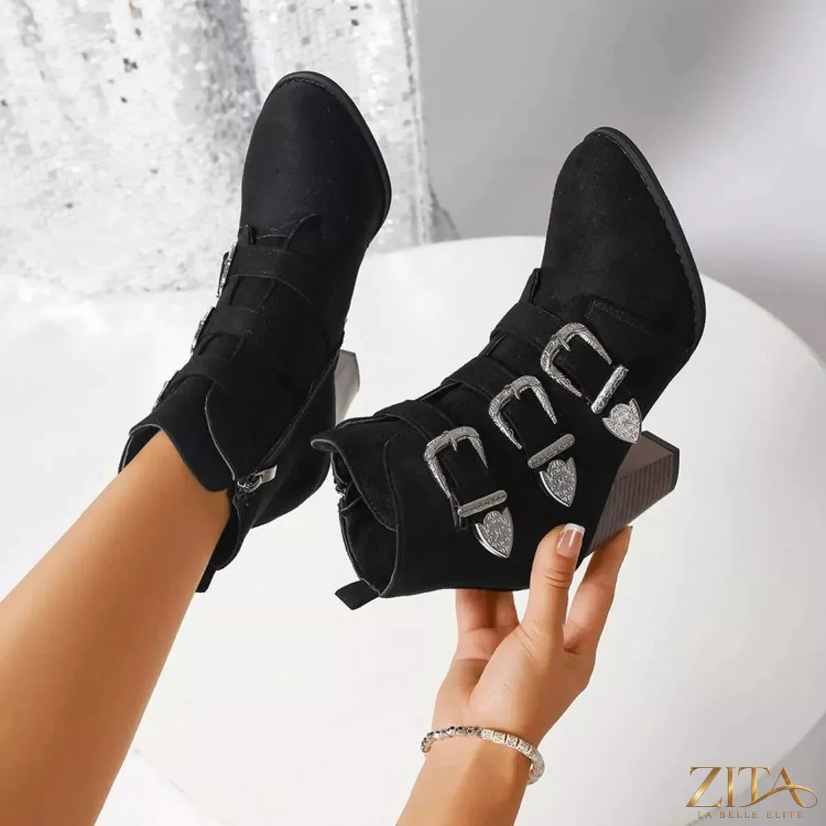 Point toe block heels boots by Trendsi featuring sleek design, black color, and stylish heel for elegant footwear.