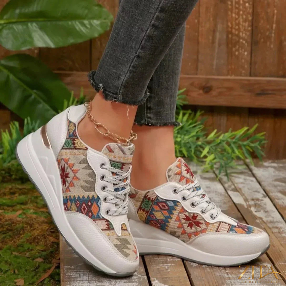 Zita La Belle Elite lace-up wedge sneakers with white and beige design, featuring chunky soles and stylish casual footwear.