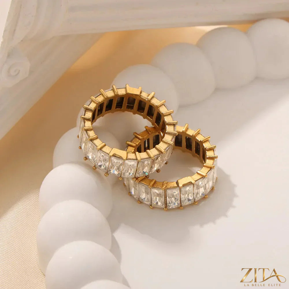 Titanium steel zircon ring with inlaid sparkling zircon stones, featuring a sleek design from Zita La Belle Elite.