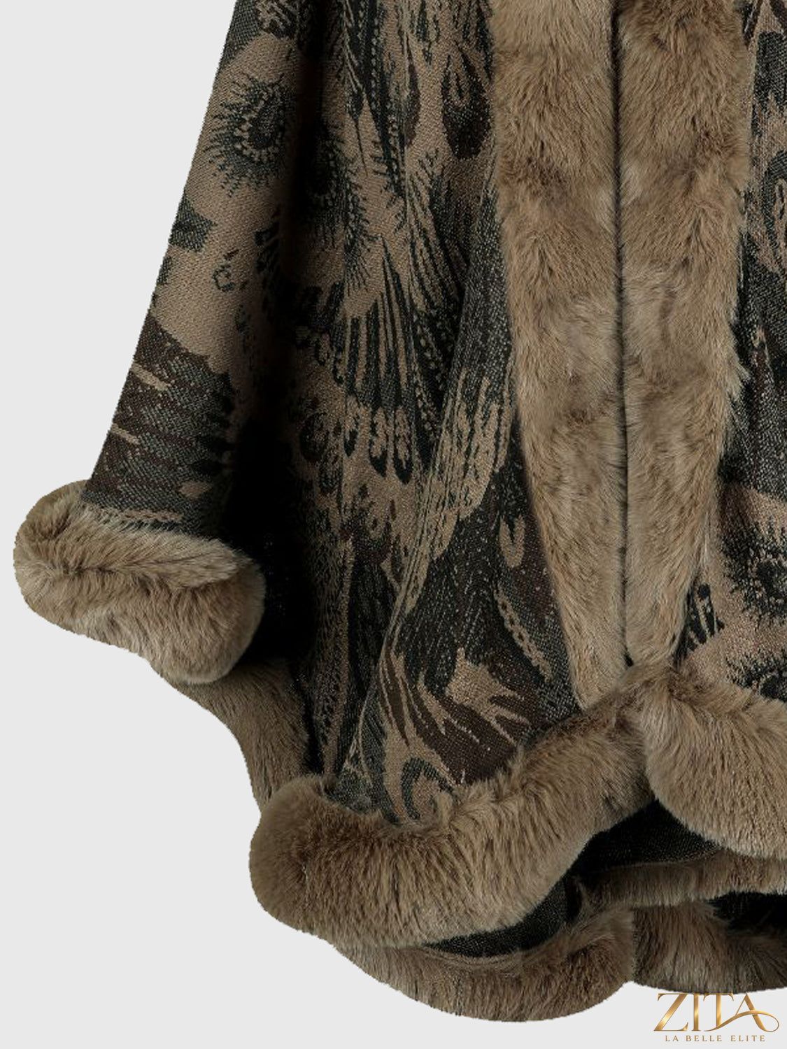 Printed open front poncho from Trendsi, featuring a stylish design with a flowing silhouette and lightweight fabric.