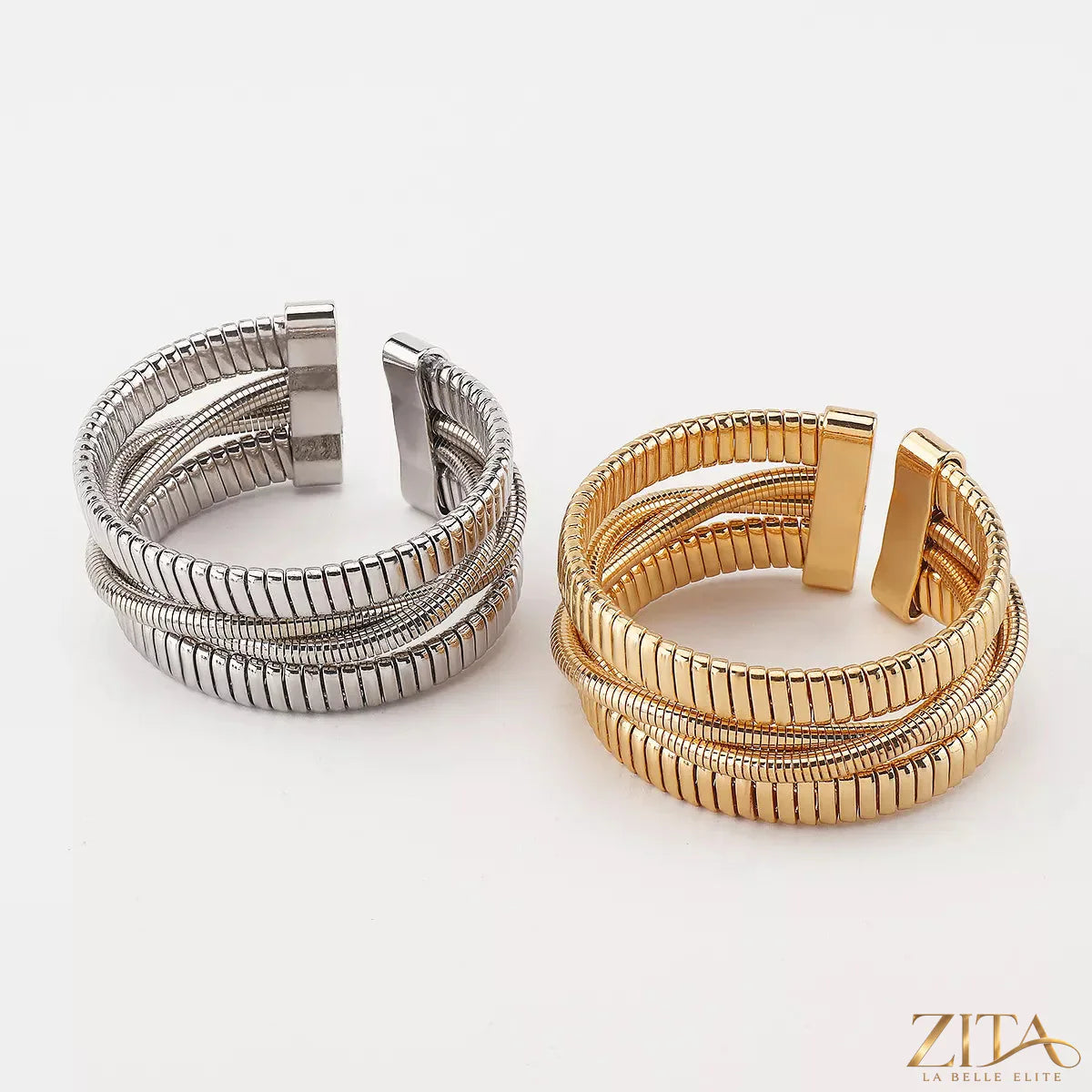 Multi-layered open bracelet by Zita La Belle Elite featuring delicate gold and silver chains with adjustable design.