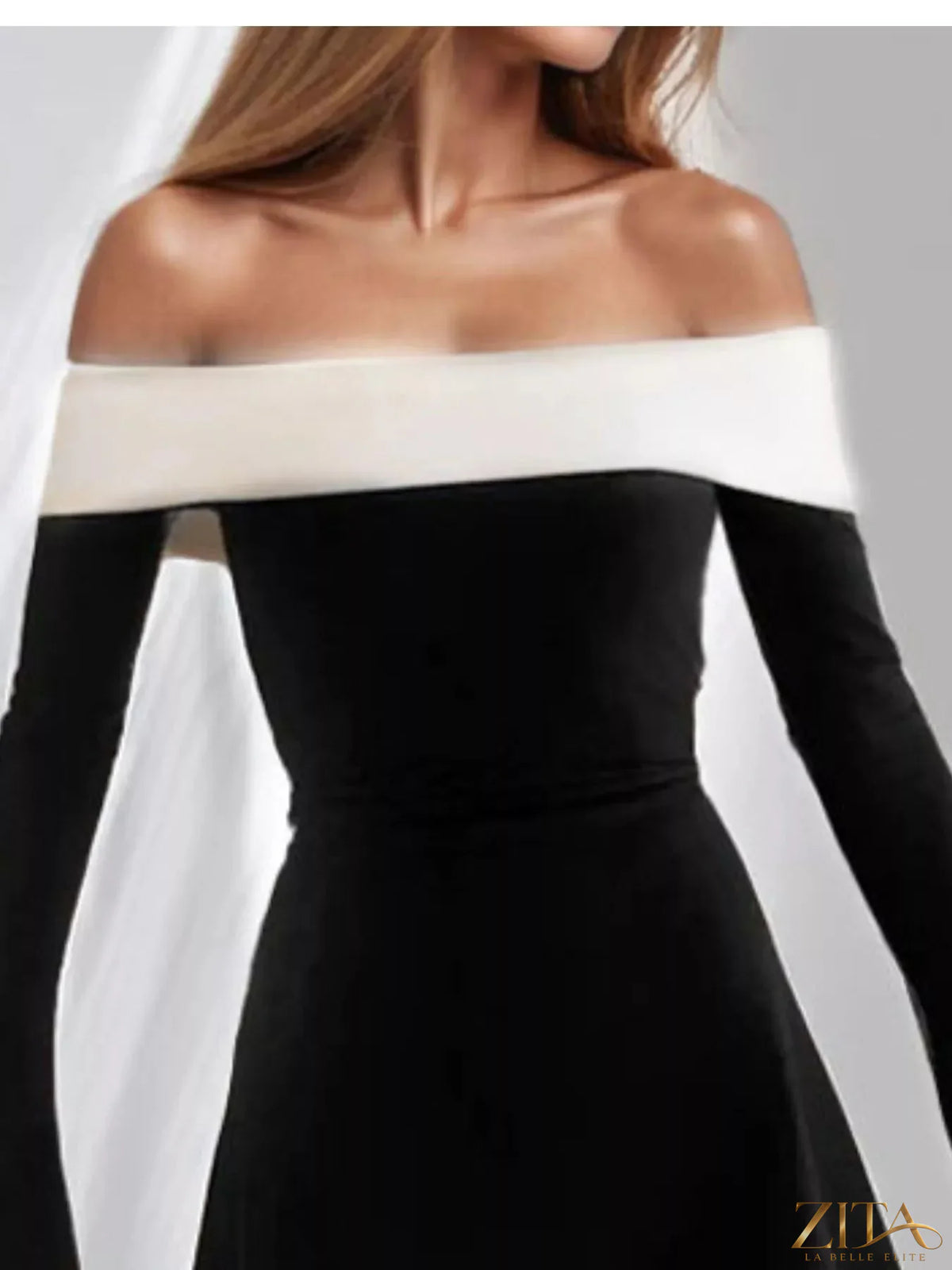 Zita La Belle Elite off-shoulder flare sleeve mini dress in soft fabric, featuring a fitted bodice and flared sleeve design.