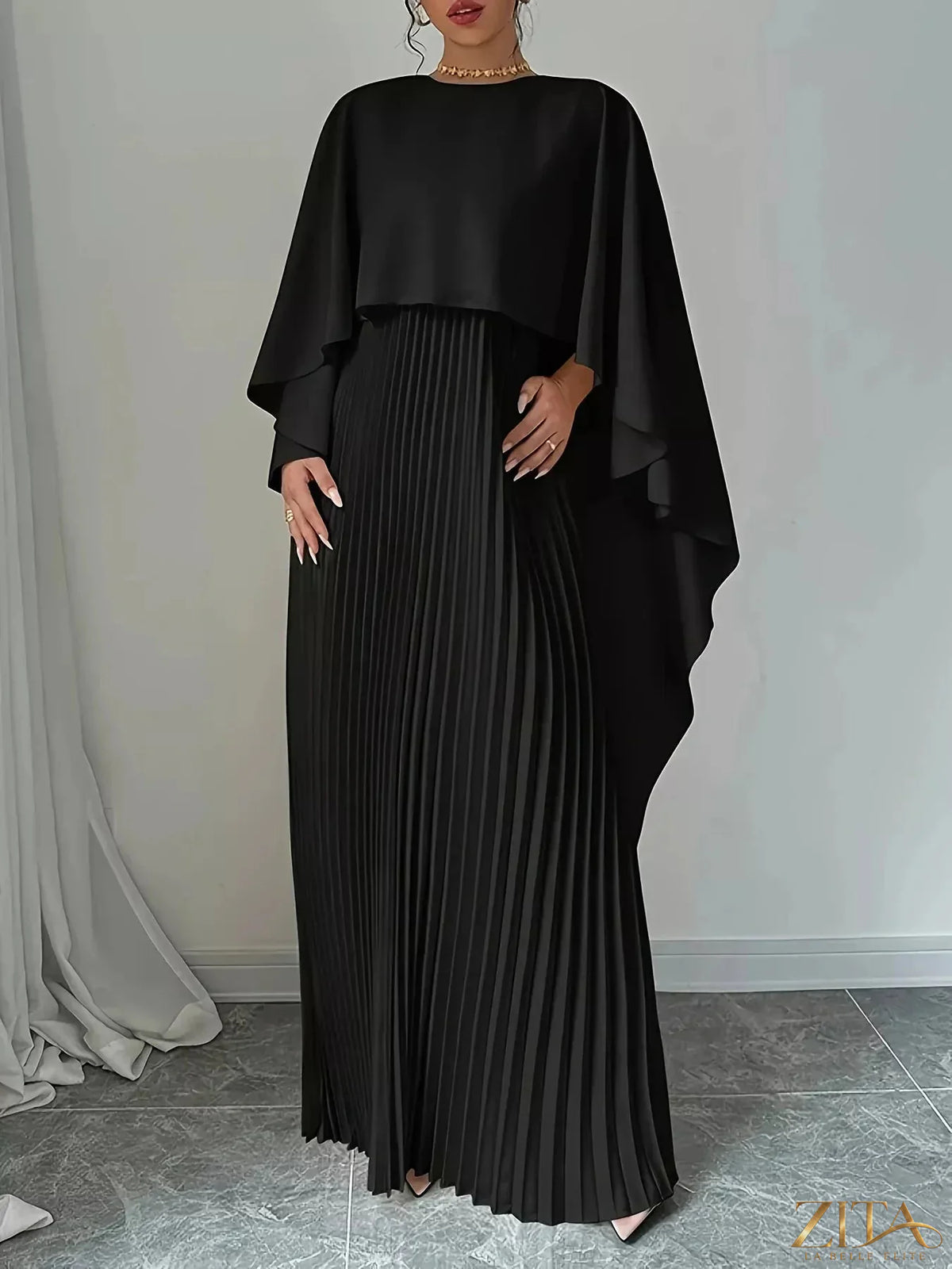 Elegant navy blue cape pleated maxi dress from Trendsi with flowing fabric and tiered design, perfect for formal occasions.