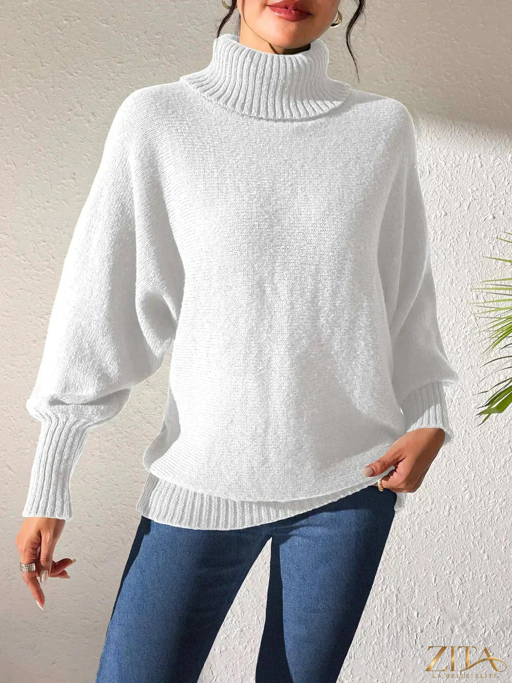 Zita La Belle Elite turtleneck long sleeve sweater in cozy knit, fitted design, in a neutral color.