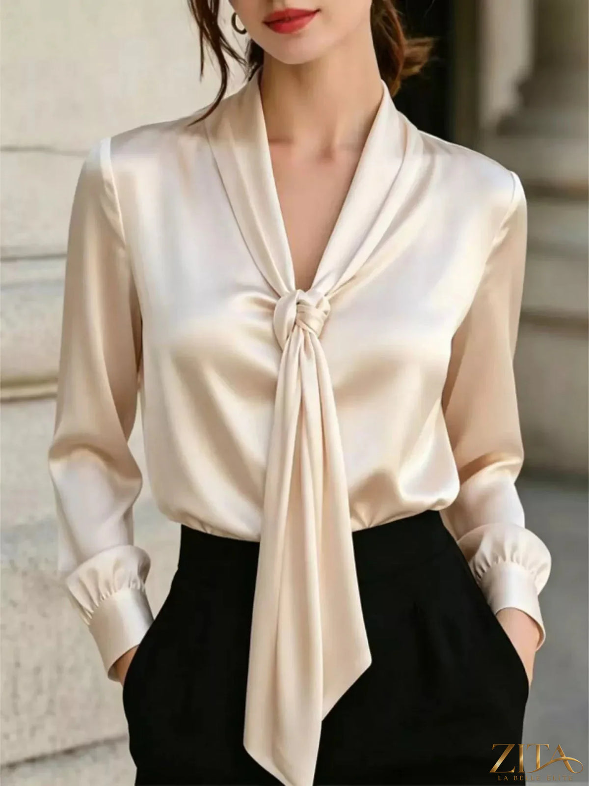 Zita La Belle Elite satin blouse with front tie detail, featuring a stylish and elegant design in a smooth, shiny fabric.