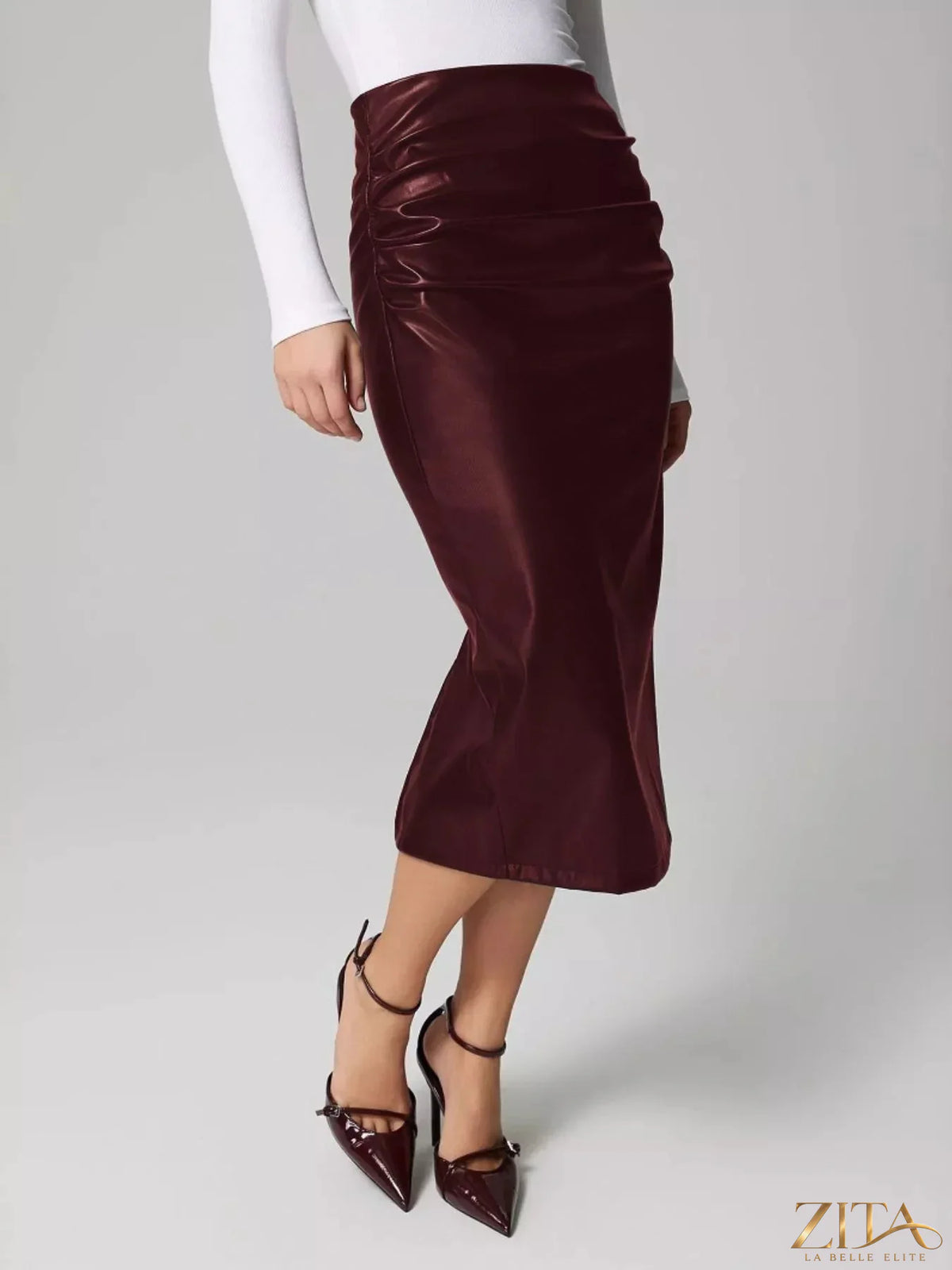 Zita La Belle Elite slit back leather skirt in black, stylish high-waisted design with a prominent back slit and smooth leather texture.