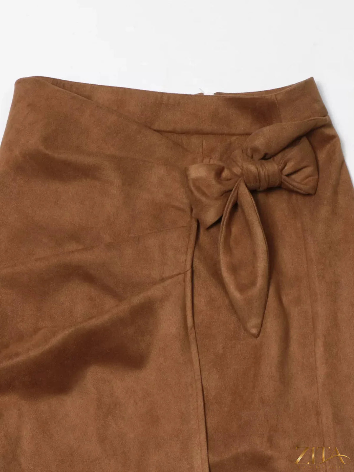 Trendsi wrap midi skirt in soft fabric with a stylish, flowy design, shown in a natural pose highlighting the skirt's length and fit.