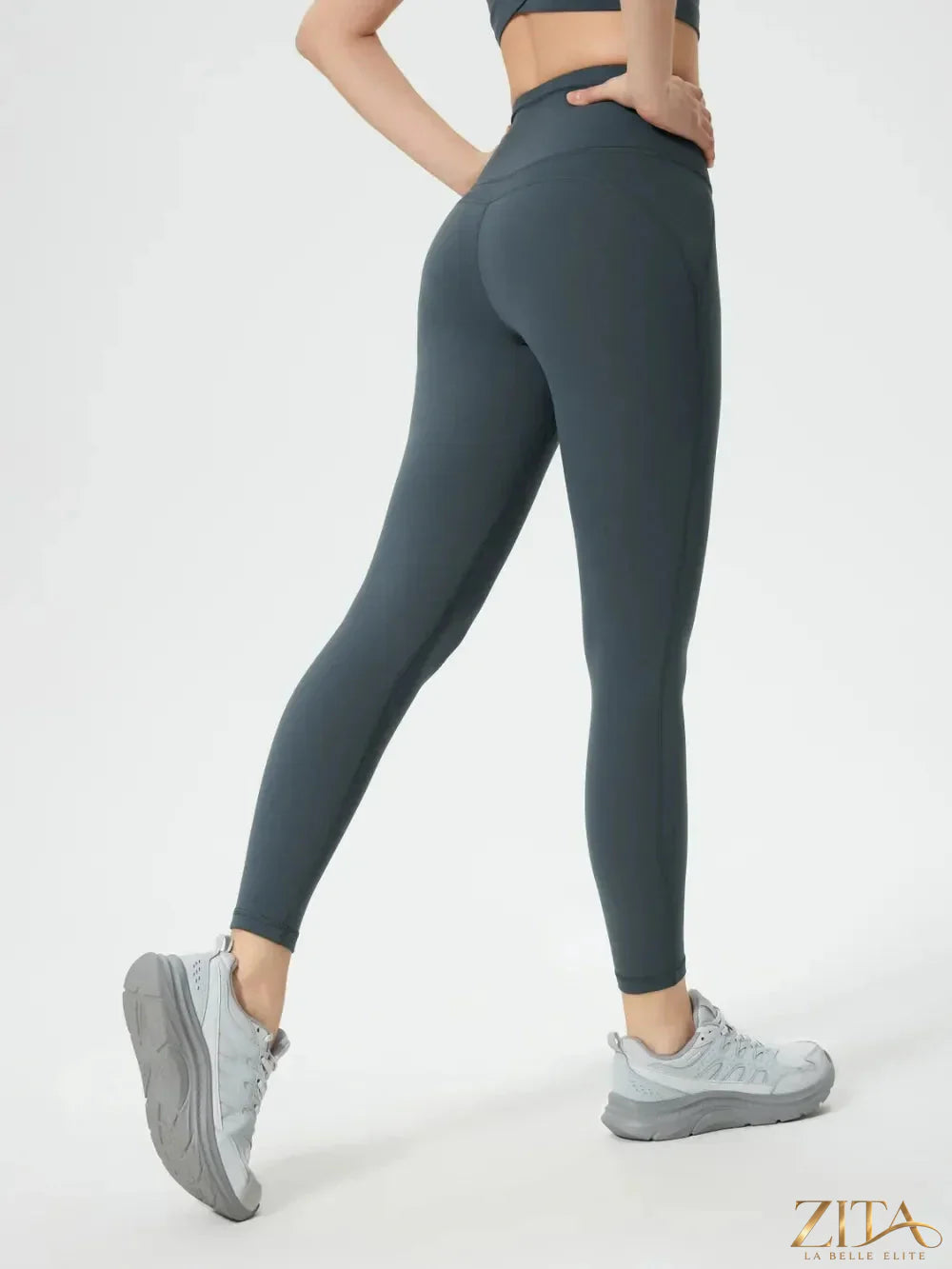 Trendsi Millennia wide waistband active leggings in black, featuring a comfortable stretch fit and sleek design for workout or casual wear.