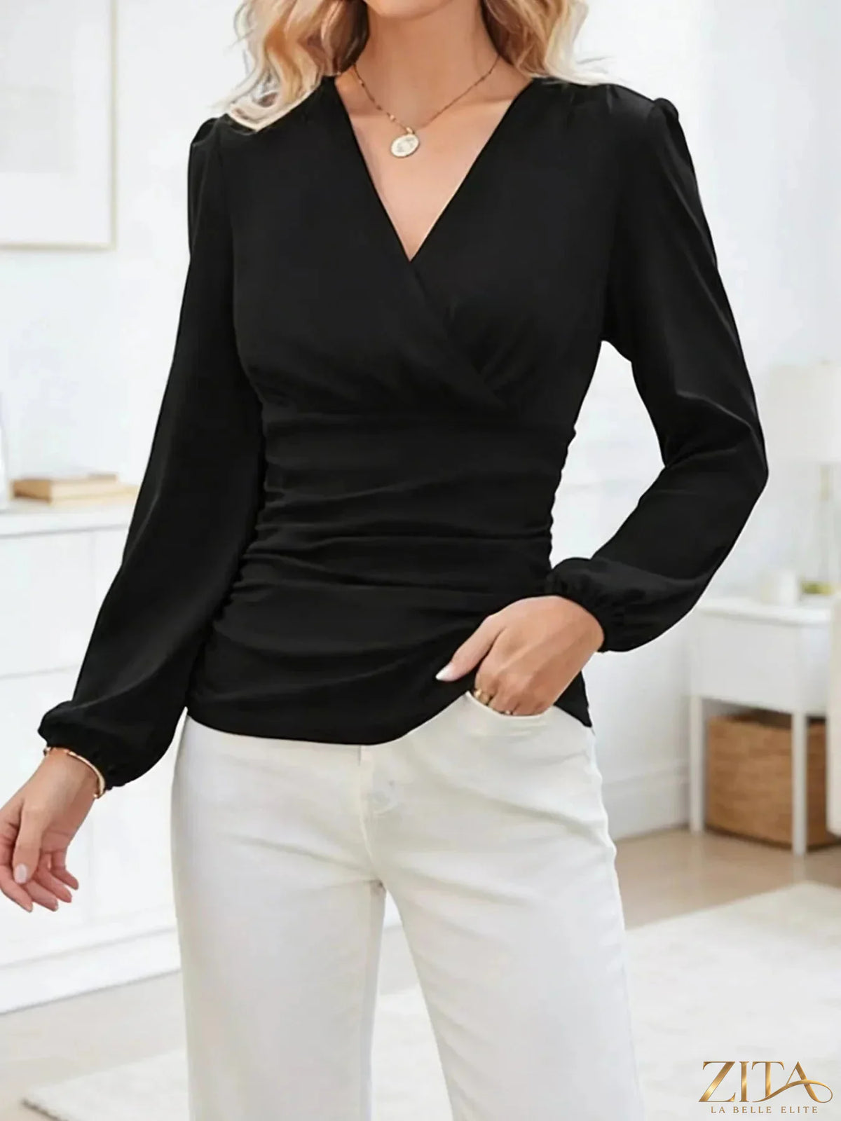Zita La Belle Elite long sleeve ruched blouse in a soft fabric, featuring a fitted style with gathered detailing on the sleeves.