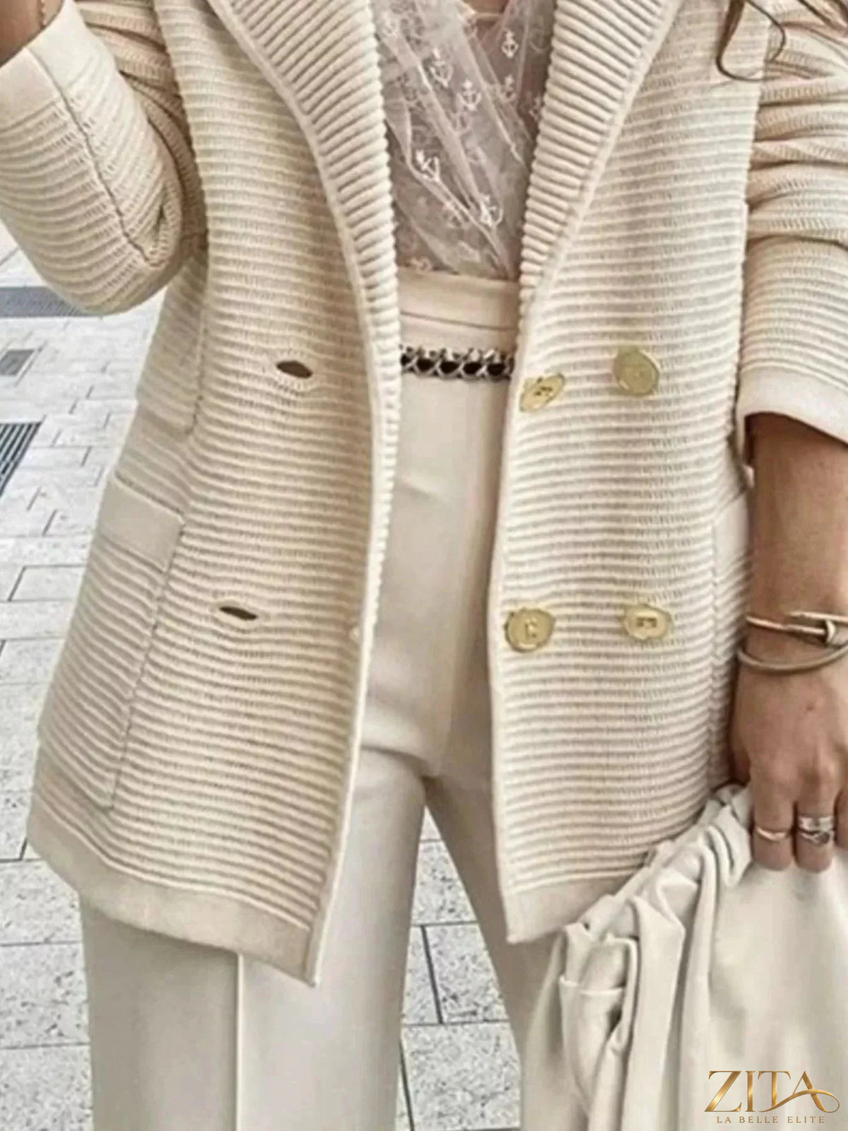 Zita La Belle Elite texture knit double-breasted blazer shown on a hanger, featuring a tailored fit and classic lapel design.