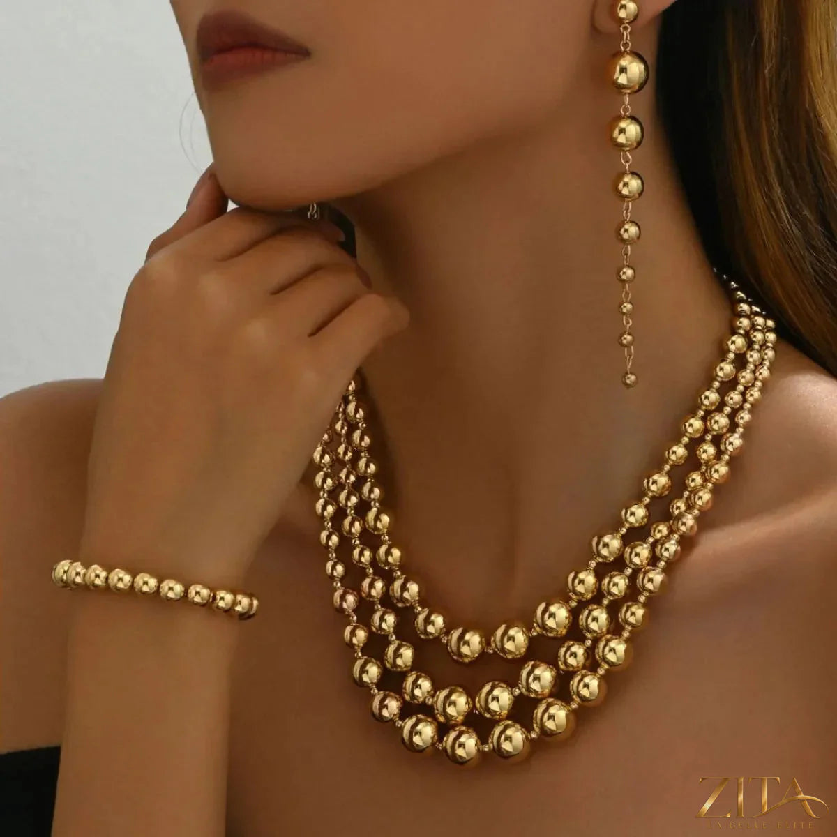 18K gold-plated layered beaded jewelry set with matching necklace and earrings by Zita La Belle Elite.
