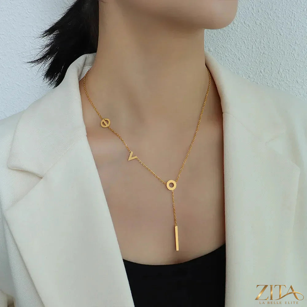 Titanium steel letter necklace by Zita La Belle Elite featuring a sleek, modern pendant on a delicate chain.