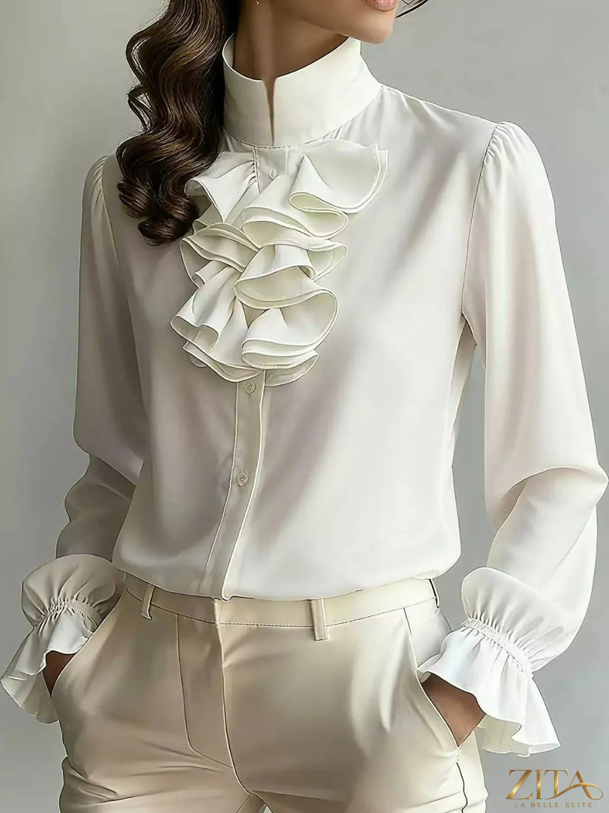 Zita La Belle Elite ruffled stand-collar blouse with long lantern sleeves, showcasing elegant design and feminine details.
