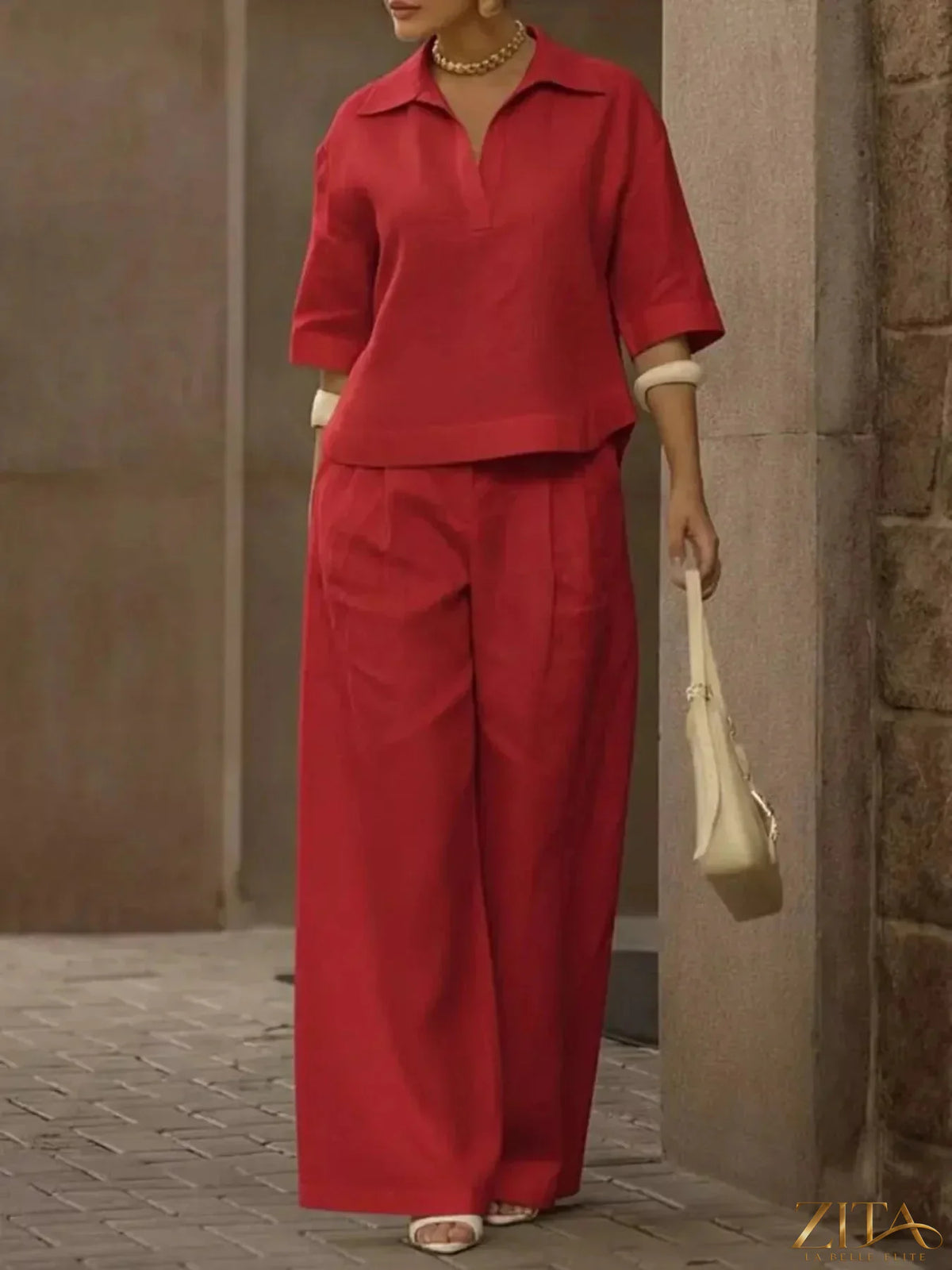 Zita La Belle Elite plus size two-piece set featuring a full-size 3/4 sleeve top and wide-leg pants, stylish and comfortable.