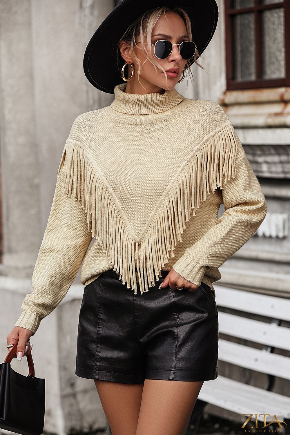 Turtle neck tassel front long sleeve pullover sweater in soft fabric, featuring a stylish turtle neck and tassel details from Trendsi
