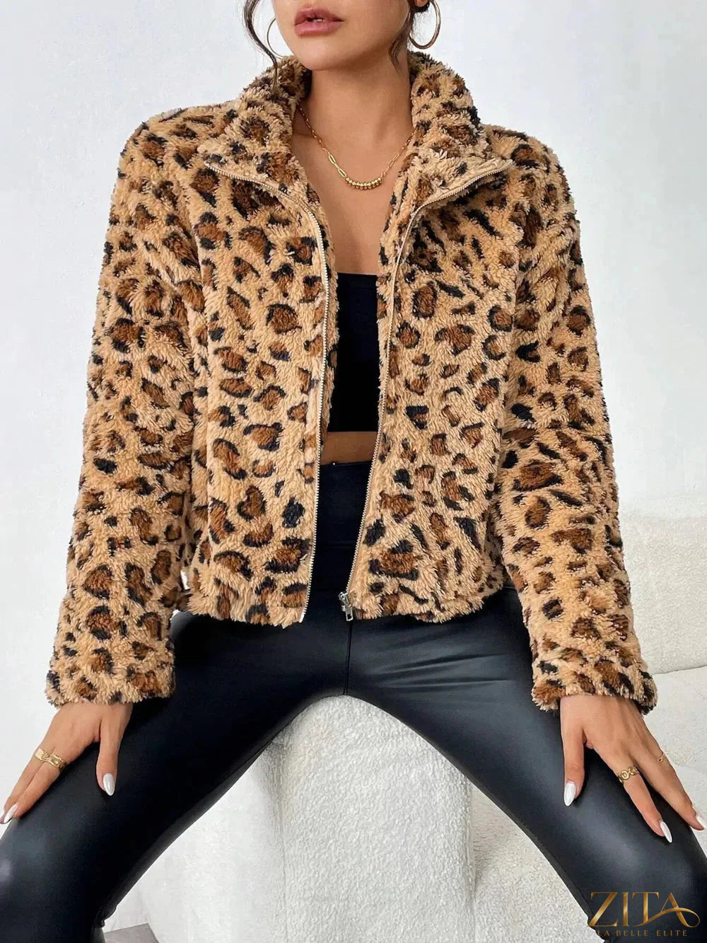 Fuzzy leopard print turtleneck zip-up jacket from Trendsi with a cozy, stylish design and front zipper detail.