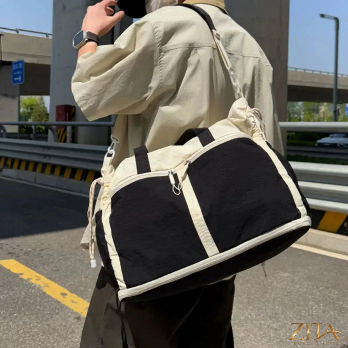 Color block Zita La Belle Elite travel bag with multiple compartments and sturdy handles, ideal for stylish trips.