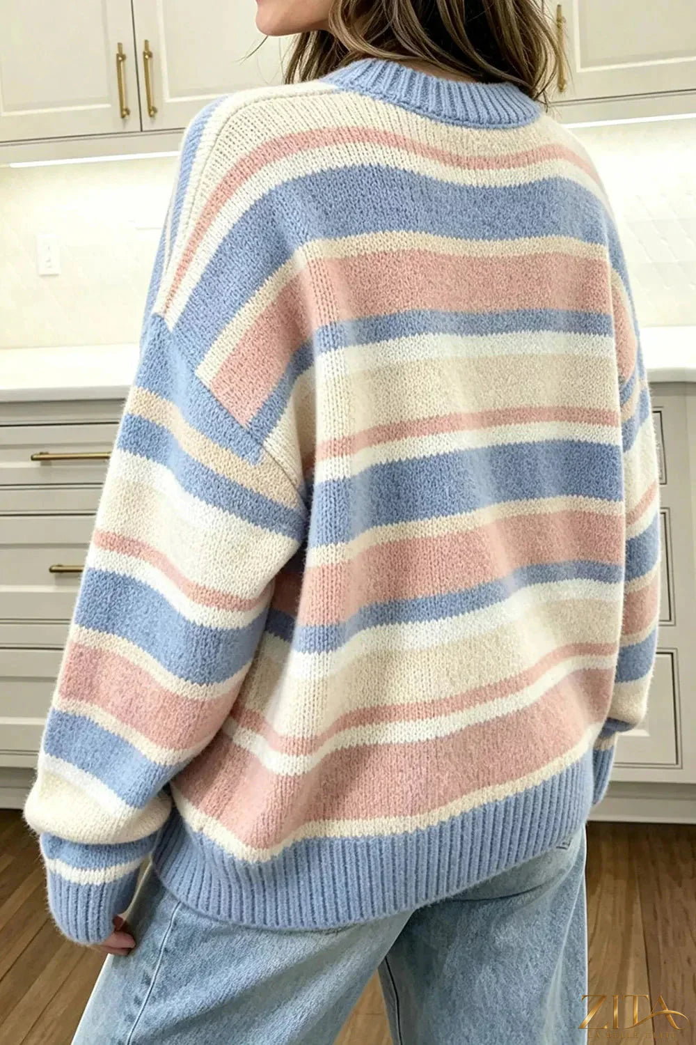 Zita La Belle Elite striped dropped shoulder sweater with multicolor horizontal stripes and cozy knit fabric.