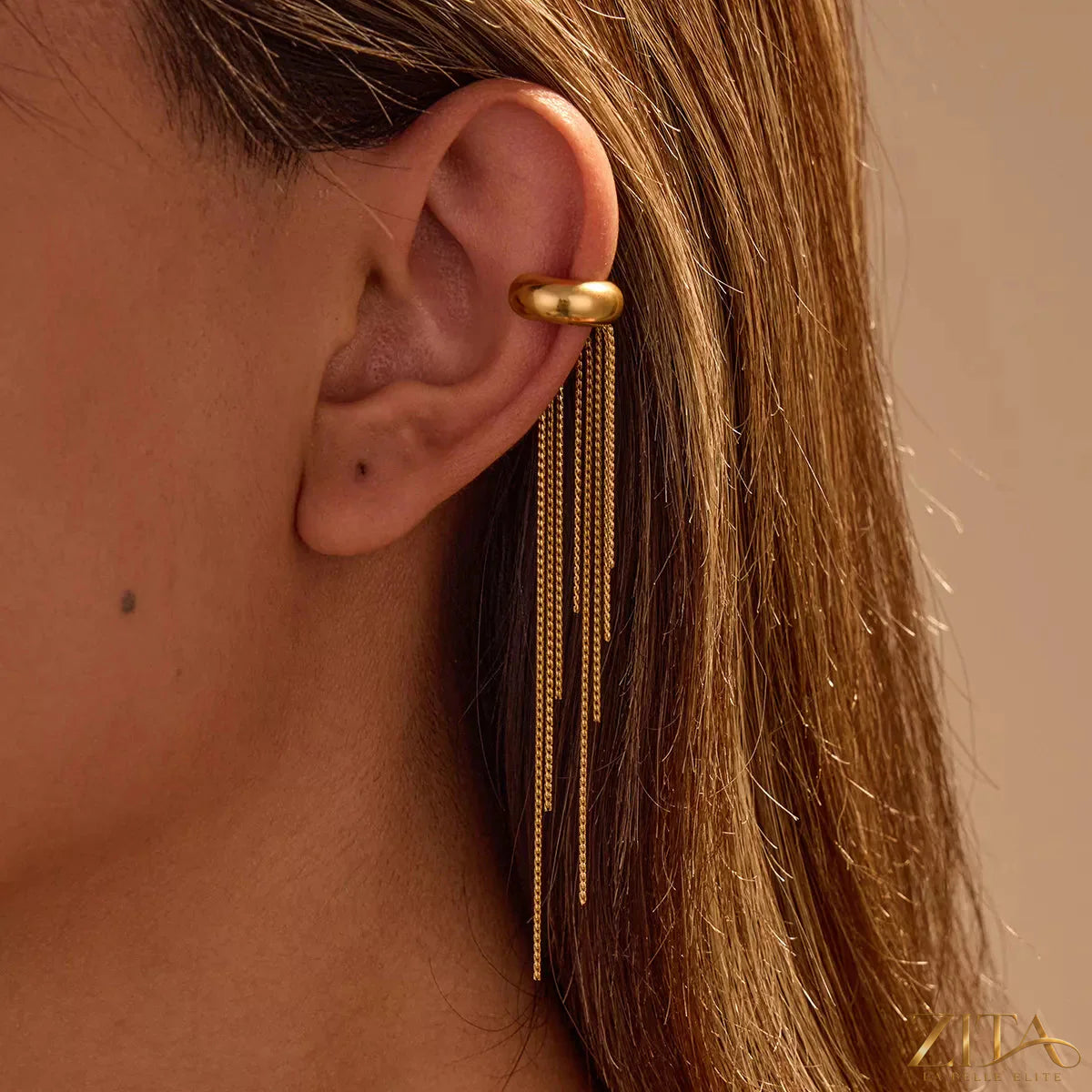 18K gold-plated tassel ear cuff earrings by Zita La Belle Elite, featuring delicate dangling tassel design on a sleek ear cuff.