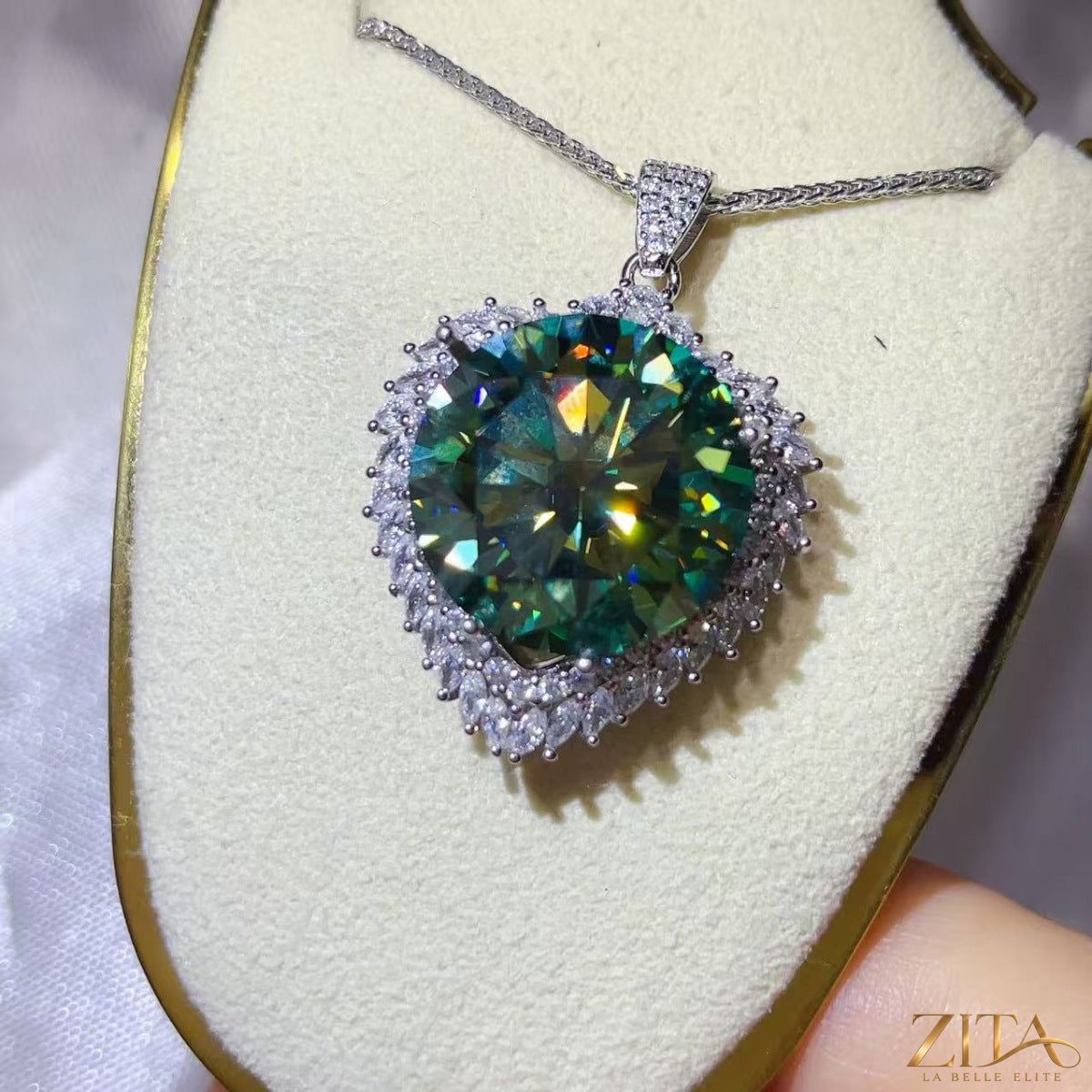 Sterling silver pendant necklace with a 20-carat moissanite gemstone, featuring a sleek and elegant design.